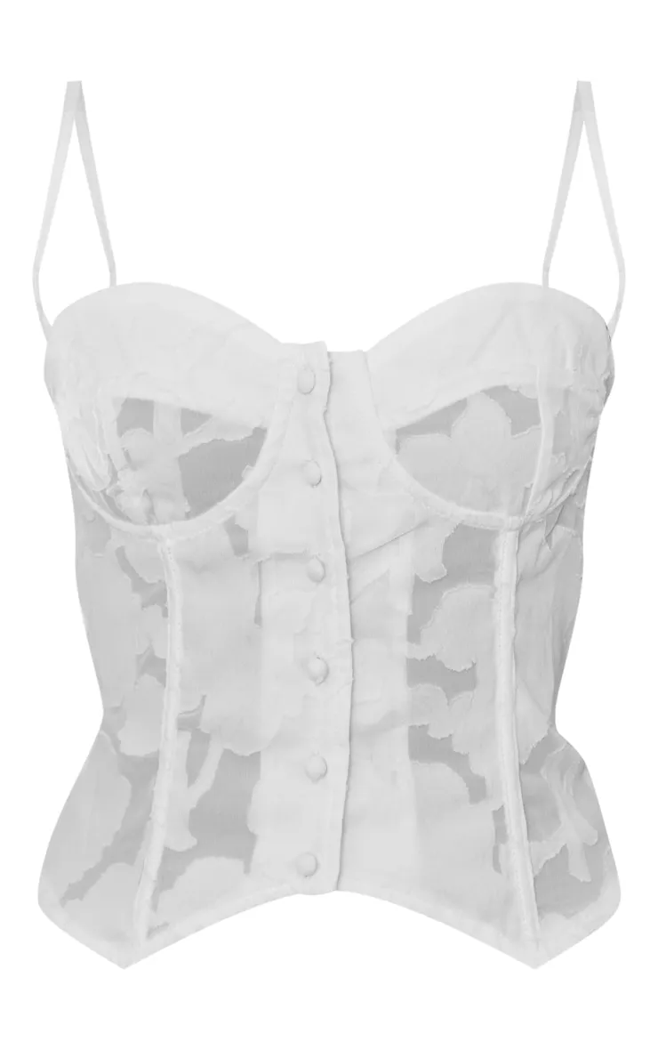 Corset fleuri texturé blanc à détail armatures et boutons